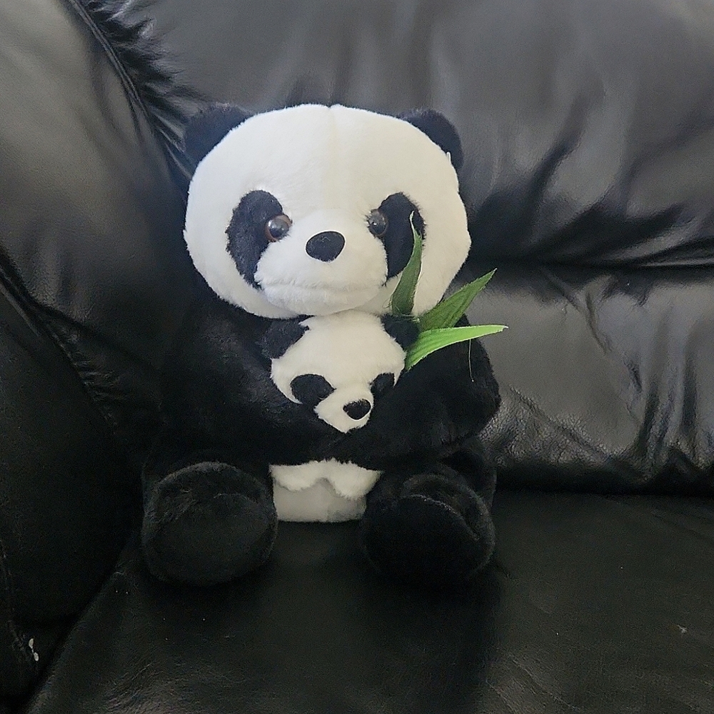 Stuffed Panda with bamboo leaf
